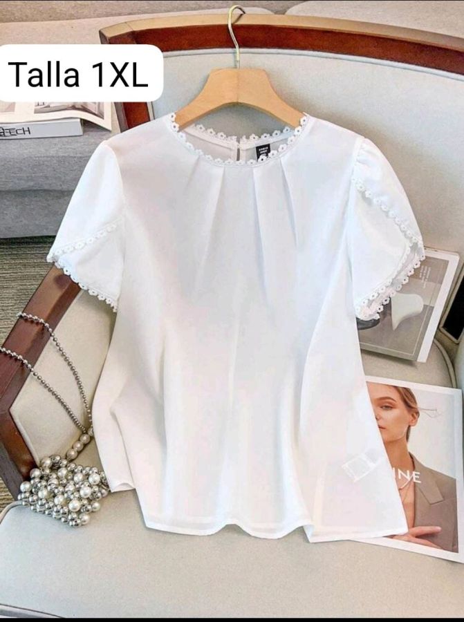 Blusa tela seda mango
